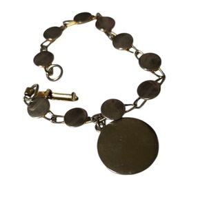 vintage mid-century gold over silver tone charm bracelet